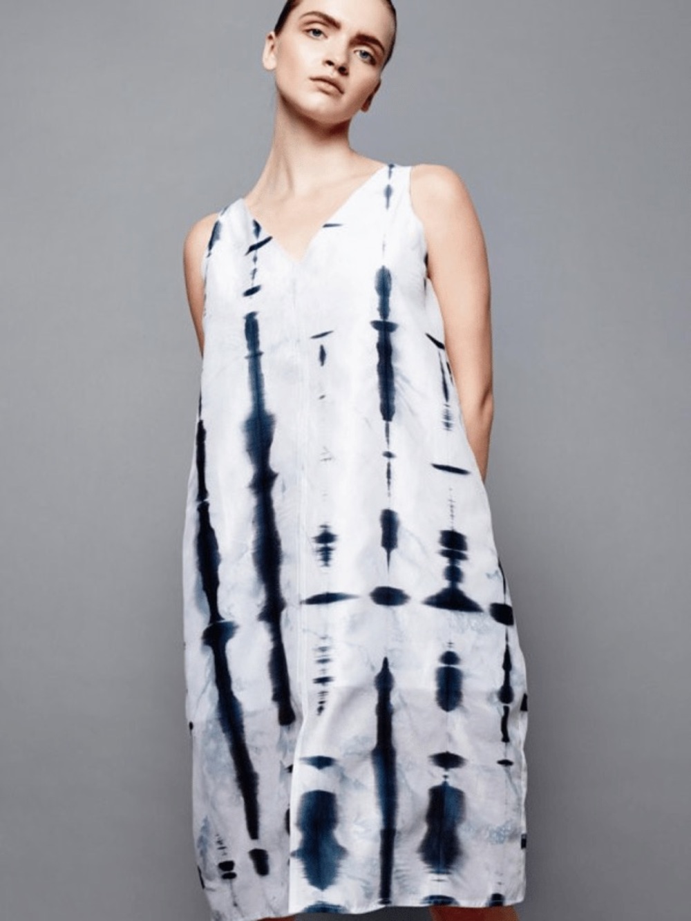 White shibori dyed sleeveless dress in silk cotton from Devlyn van Loon